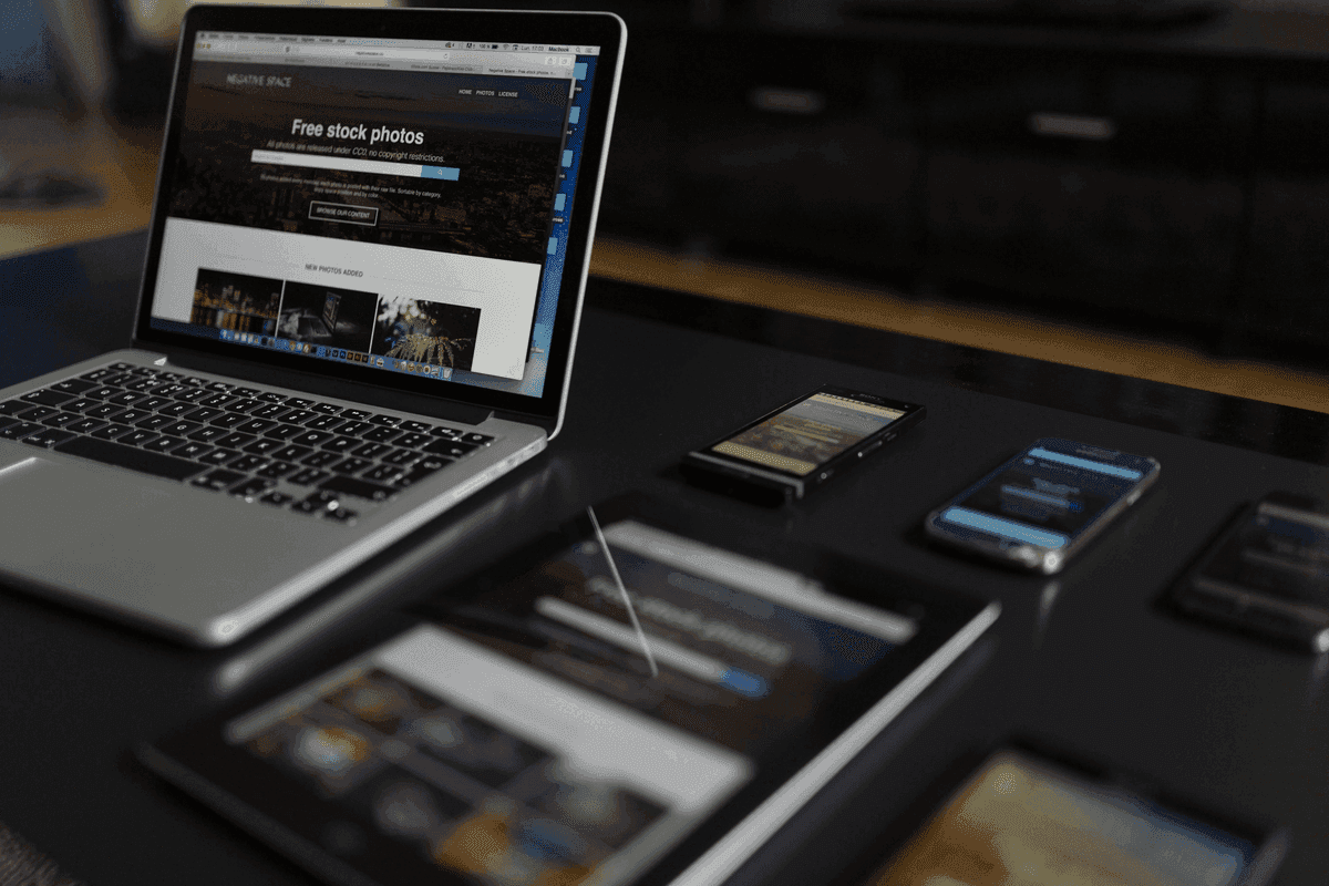 Mobile first e-commerce design with smartphone, tablet and laptop showing responsive web design.